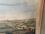 painting of a view of a city with a train coming down the tracks