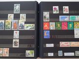 a book with stamps on the pages of it