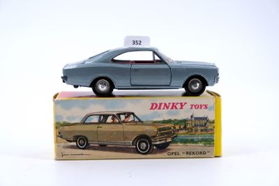 a small toy car sitting on top of a box