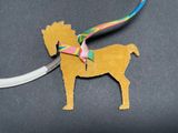 a picture of a horse with a ribbon on it ' s neck