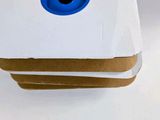 a white box with a blue hole on top of it