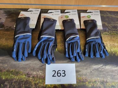 four pairs of blue gloves are on display in a display case