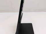 a cell phone that is sitting on top of a stand