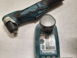 a cordless drill and a cordless hammer on a table