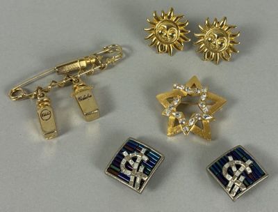 four pairs of gold and silver jewelry including a star of david, a star of david, a star of david, and a star of david
