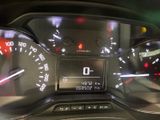 the dashboard of a car with a speedometer and gauges