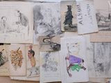 many drawings of people and animals on the wall