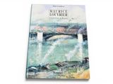 a book with a picture of a bridge in the background