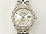 une montre Rolex dotée d'une lunette sertie de diamants