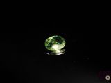 an image of a close up of a green gemstone