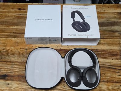a box with a pair of headphones in it on a table