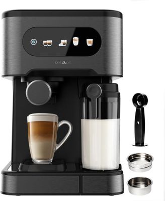 an image of a coffee machine with a glass of milk and spoons