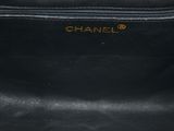 a chanel black leather handbag with gold hardware