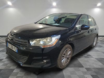 a picture of a black car parked in a garage