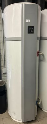 three water heaters in a room with a trash can
