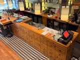 a picture of a bar with a checkered floor and a checkered floor