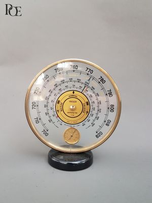 a clock that is sitting on top of a table