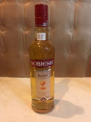a bottle of alcohol that is sitting on a table