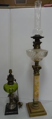 two lamps that are sitting on a table next to each other