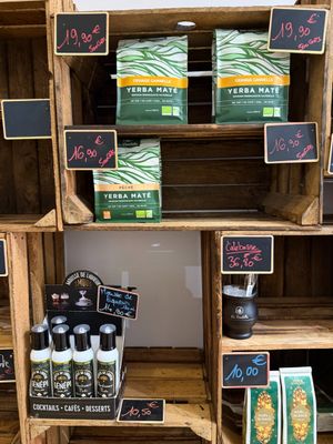 many wooden crates with different types of items on them