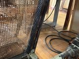 a chair that has a metal frame on top of it