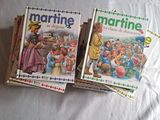 trois livres pour enfants empilés les uns sur les autres sur un lit