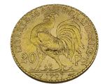an image of a gold coin with a rooster on it