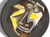 a picture of a plate with a painting on it
