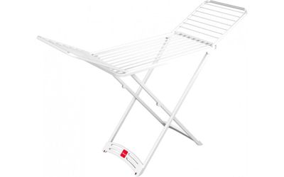 une planche à repasser blanche posée sur une table blanche
