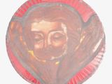 a picture of a painting of a woman on a plate