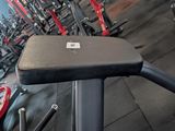 a close up of a bench in a gym