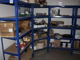 a blue shelving with lots of boxes and boxes on it