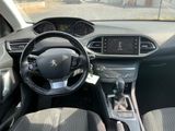 the interior of a car with a steering wheel and dashboard controls