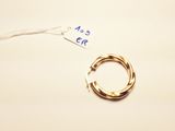 a gold ring with a price tag attached to it
