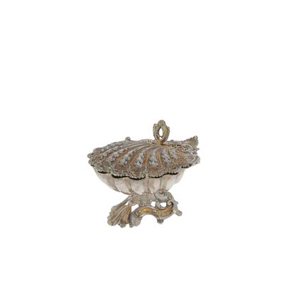 an image of a silver plate with a bird on it