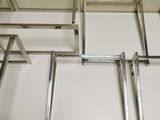 four pieces of metal on a white counter top
