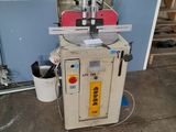 a machine that is sitting on the floor in a garage