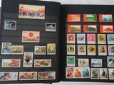 a black book with a bunch of stamps on it