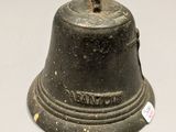 a bell that is sitting on a table