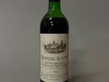 a bottle of wine that is sitting on a table