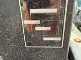 an image of a parking meter with a sticker on it