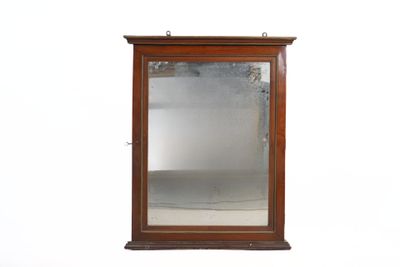 a mirror that is on the wall in the room