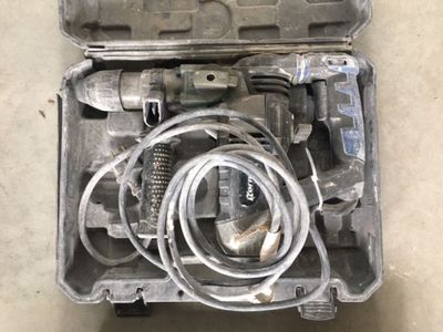 a tool in a case that is sitting on the floor