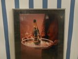 a picture of a picture of a bottle of wine on a tray