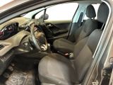 the interior of a car with the door open showing the steering wheel and dashboard