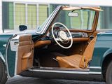 a green car with a brown leather seat and steering wheel