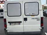 a white van that is parked in a parking lot