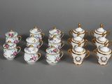 an image of a collection of porcelain tea and coffee cups and saucers
