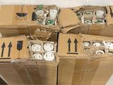 several boxes of electronic devices are stacked on top of each other