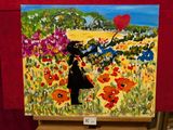 un tableau représentant une femme tenant un ballon rouge dans un champ de fleurs
